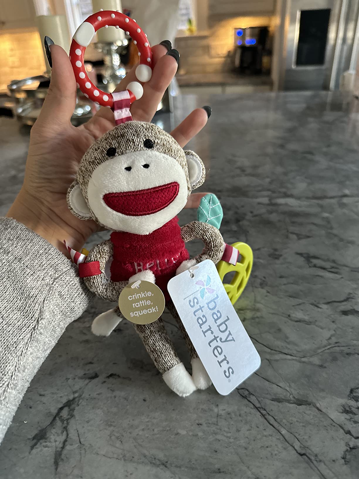 Customer photo of a sock monkey plush